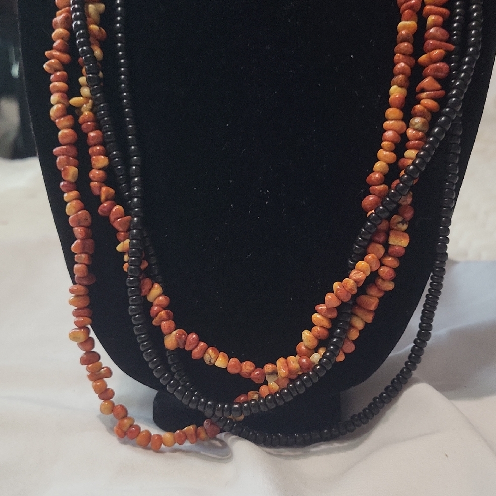 Apple Coral And Black Bead